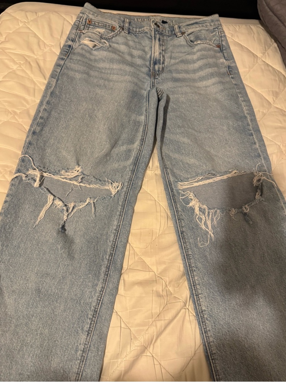 American Eagle Outfitters Light Blue Distressed Strigid Jeans